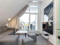 TV a/nebo společenská místnost v ubytování Holiday Home Strandblick IV