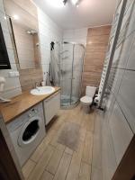 Kúpeľňa v ubytovaní Apartament Zacisze