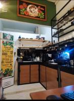 Kuchyň nebo kuchyňský kout v ubytování Hotel y centro de convenciones Caney del Ariari