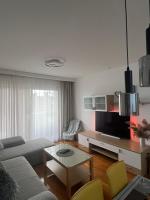 TV a/nebo společenská místnost v ubytování Apartman B&B