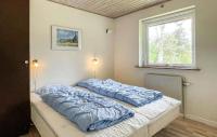 Postel nebo postele na pokoji v ubytování Lovely Holiday Home On Bornholm With Sea View