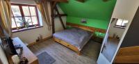 Łóżko lub łóżka w pokoju w obiekcie Family House 94