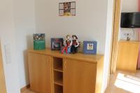 A television and/or entertainment centre at Gemütliche Ferienwohnung Für Zwei Personen