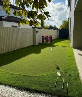 Ein Garten an der Unterkunft Miami Getaway Heated Pool Villa with Mini Golf &amp; BBQ