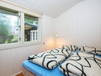 Postel nebo postele na pokoji v ubytování Holiday home Hemmet CCXLIX