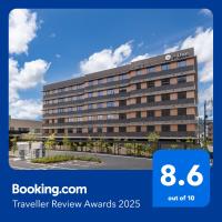 una representación de un edificio hotelero con los premios de revisión de viajes en Onn Yuda Onsen, en Yamaguchi