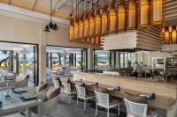 Um restaurante ou outro lugar para comer em Banyan Tree Lang Co