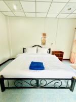 Postel nebo postele na pokoji v ubytování TAMONWAN HOUSE Koh Tao