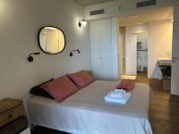 Łóżko lub łóżka w pokoju w obiekcie A0 Magnifique Appt 6 personnes Lofts de St Lucie