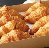 a box of croissants sitting on a table at Essenzia de Cancun in Cancún