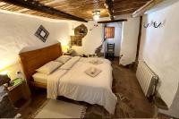 Posteľ alebo postele v izbe v ubytovaní Cinco Lunas VEGETARIAN Guesthouse