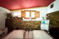 Posteľ alebo postele v izbe v ubytovaní Cinco Lunas VEGETARIAN Guesthouse