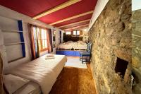 Posteľ alebo postele v izbe v ubytovaní Cinco Lunas VEGETARIAN Guesthouse