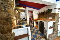 Kuchyňa alebo kuchynka v ubytovaní Cinco Lunas VEGETARIAN Guesthouse