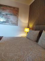 Posteľ alebo postele v izbe v ubytovaní Meteora Olio Hills apartment