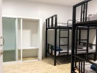 Postel nebo postele na pokoji v ubytování Prukpibul Apartment