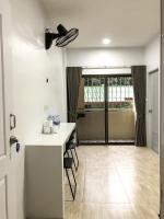 Kuchyň nebo kuchyňský kout v ubytování Prukpibul Apartment