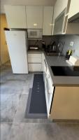 Kuchyňa alebo kuchynka v ubytovaní Mandy Apartman