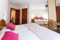 Posteľ alebo postele v izbe v ubytovaní Hostal Hispano