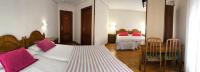 Posteľ alebo postele v izbe v ubytovaní Hostal Hispano