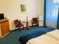 Postel nebo postele na pokoji v ubytování Penzion Hotelu Central