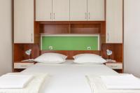Posteľ alebo postele v izbe v ubytovaní Guest House Damir
