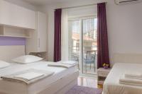 Posteľ alebo postele v izbe v ubytovaní Guest House Damir
