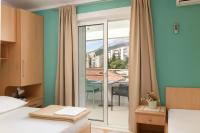 Posteľ alebo postele v izbe v ubytovaní Guest House Damir