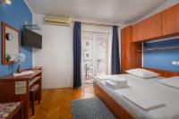 Posteľ alebo postele v izbe v ubytovaní Guest House Damir
