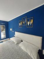 Posteľ alebo postele v izbe v ubytovaní Be Blu Apartment