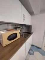 Kuchyňa alebo kuchynka v ubytovaní Be Blu Apartment