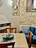 A seating area at Casa Adua by TraMonti Apartments