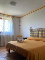 Posteľ alebo postele v izbe v ubytovaní Agribike Agriturismo Poggio Rossino