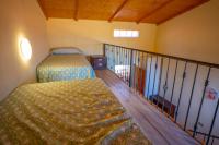 Postel nebo postele na pokoji v ubytování Casa Rural Buda Terra