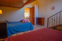 Postel nebo postele na pokoji v ubytování Casa Rural Buda Terra