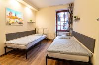 Posteľ alebo postele v izbe v ubytovaní Hostel Orange