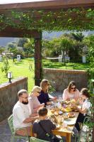 Hostia v ubytovaní Hotel Taray Botanico