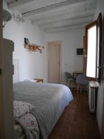 A bed or beds in a room at 4 Camere A Trani
