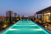 a swimming pool on the roof of a building at 昆明开臣Kasion酒店 in Kunming