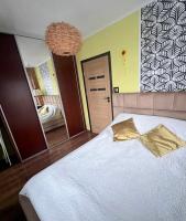 Posteľ alebo postele v izbe v ubytovaní Apartament u Kasi