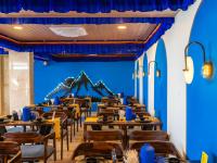 En restaurant eller et andet spisested på The Hosteller Dalhousie