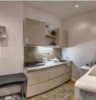 Kuchyňa alebo kuchynka v ubytovaní Diamond Apartman