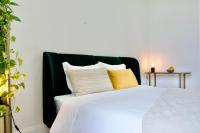 Postel nebo postele na pokoji v ubytování Vila Julieta Guesthouse