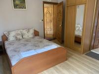 Postel nebo postele na pokoji v ubytování Villa Maxim