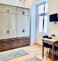 Televízia a/alebo spoločenská miestnosť v ubytovaní Diamond Apartman