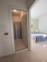Posteľ alebo postele v izbe v ubytovaní Residence Gli Stingi
