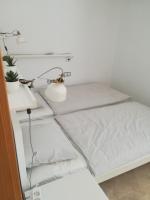 Posteľ alebo postele v izbe v ubytovaní Penthouse