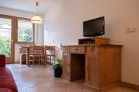 Televízia a/alebo spoločenská miestnosť v ubytovaní Fewo Dreiraum im Haus Götsch 2