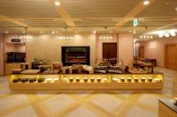 a store with a counter with a fireplace in a room at Grand Lectore Yugawara - TKP Hotels & Resorts in Yugawara
