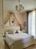 Posteľ alebo postele v izbe v ubytovaní Villa Claudia
